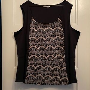 Black peplum top with lace-look front insert